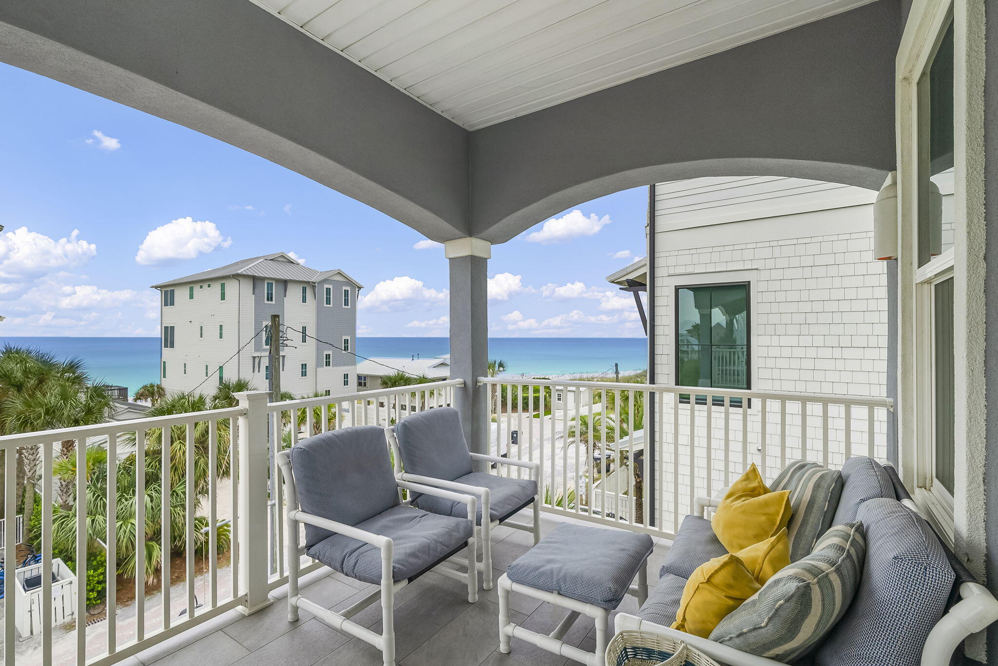 93 Emerald Cove Lane North Inlet Beach, FL 32461 - Photo 6 of 68 a view of a balcony with furniture