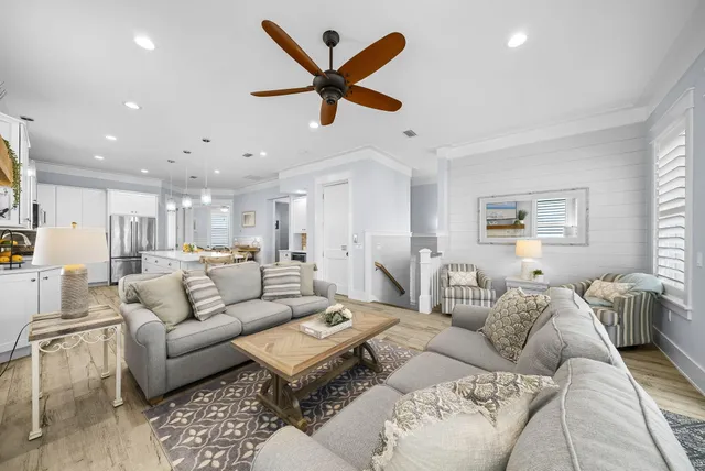 a bathroom with a granite countertop toilet a mirror and a sink