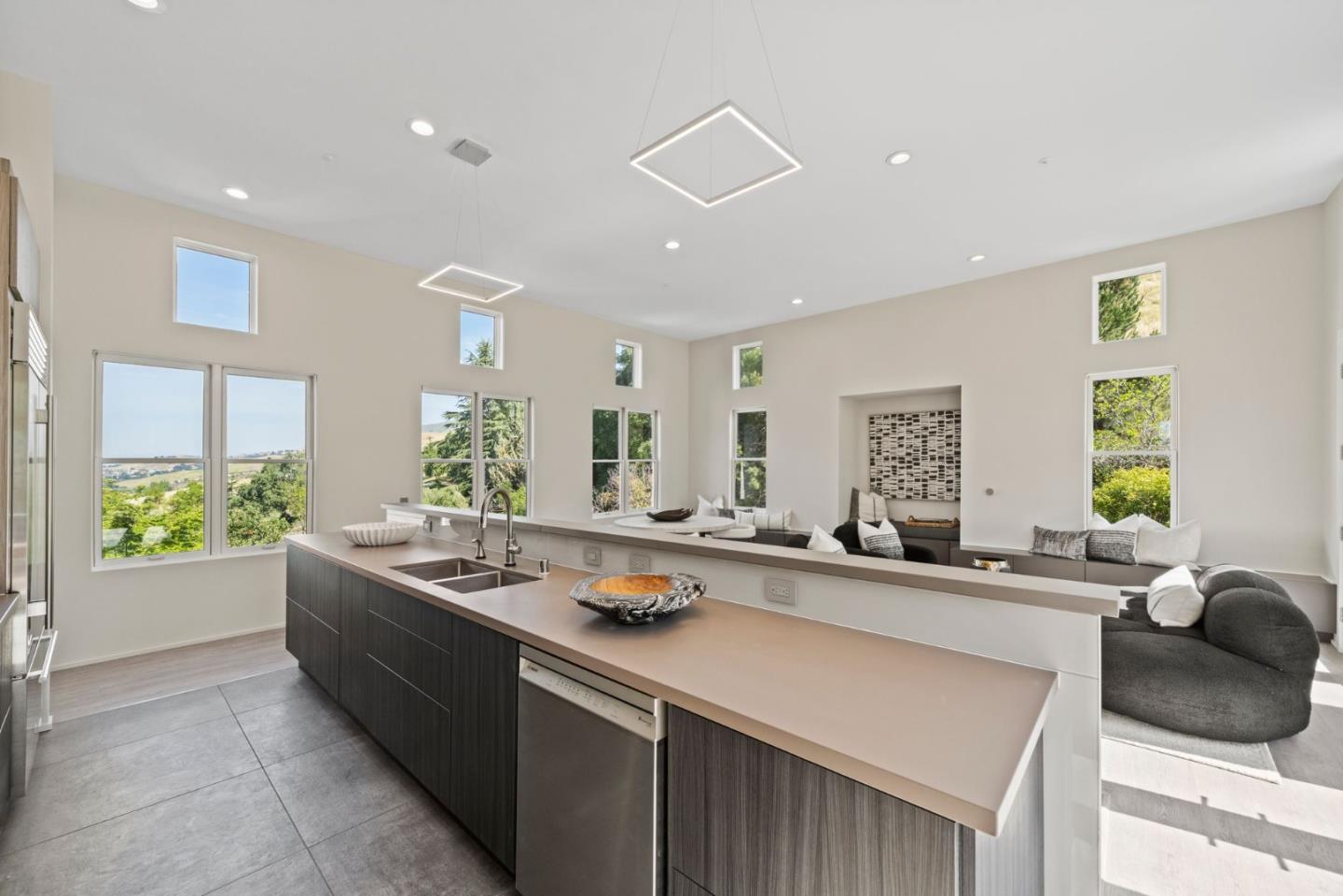 2698 Greenrock Road Milpitas, CA 95035 - Photo 17 of 99 a kitchen with sink a window and chairs