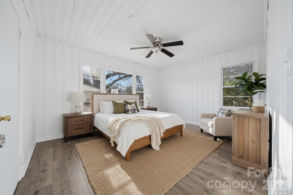 915 Airport Road Shelby, NC 28150 - Photo 21 of 37 a bedroom with a bed and a couch