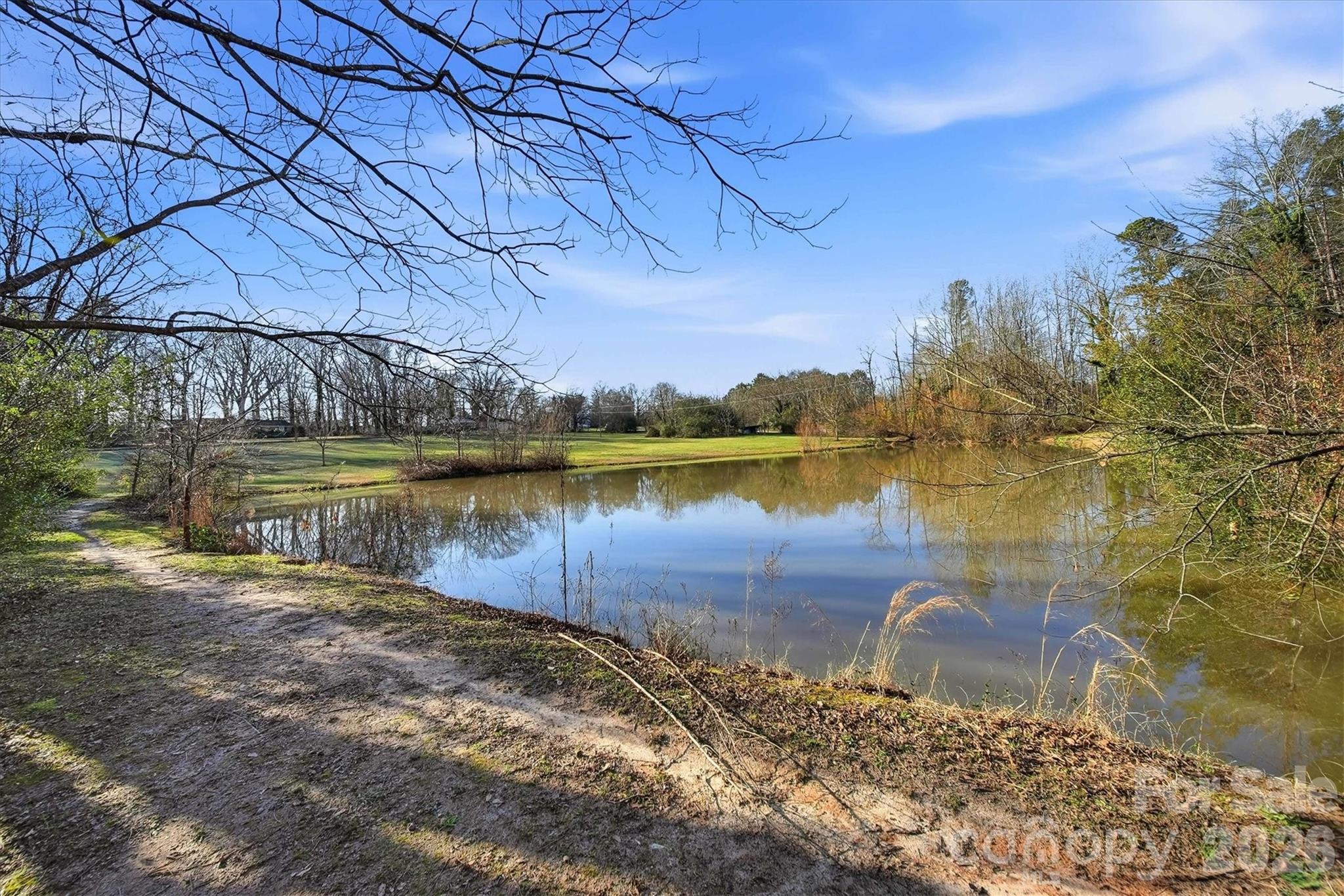 915 Airport Road Shelby, NC 28150 - Photo 29 of 37 a view of a lake with houses in the back