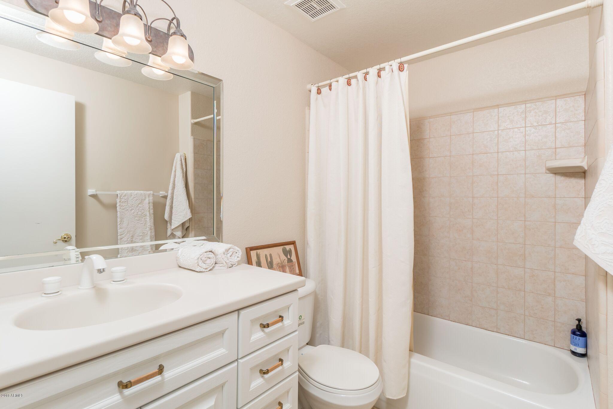 7710 East Gainey Ranch Road, Unit 225 Scottsdale, AZ 85258 - Photo 12 of 26 Guest bath