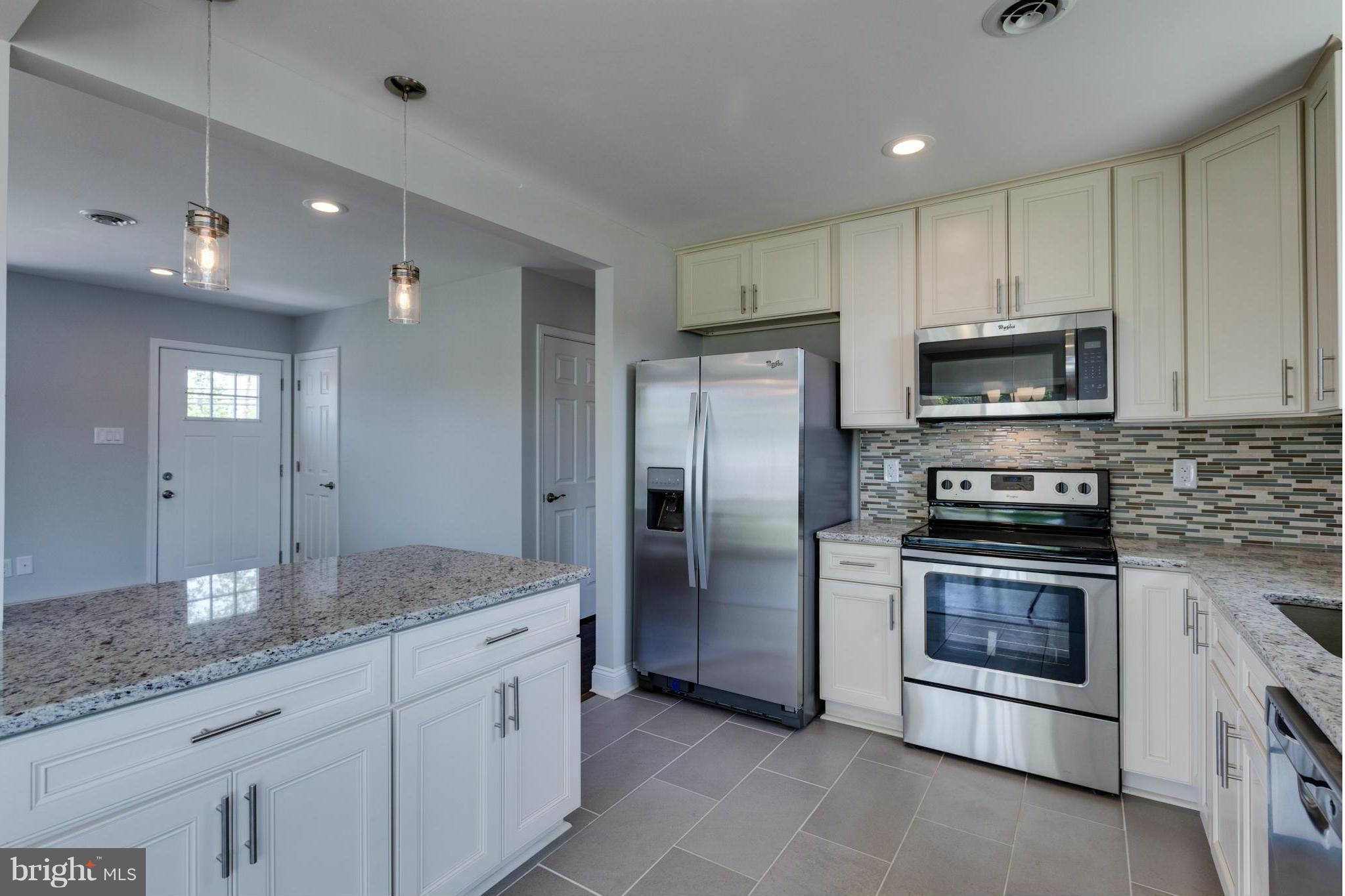 All new kitchen with Granite and Stainless Steel