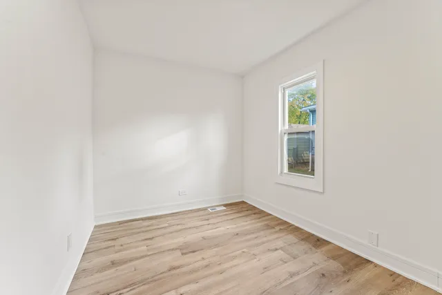 an empty room with a window