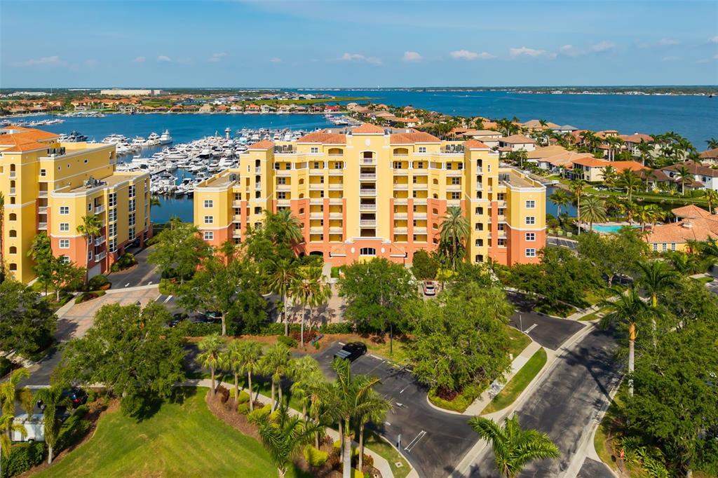 610 Riviera Dunes Way, Unit 503 Palmetto, FL 34221 - Photo 1 of 58 a view of building with outdoor space