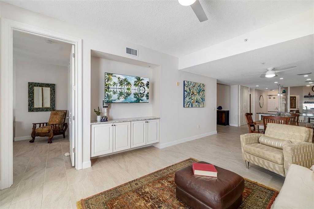 610 Riviera Dunes Way, Unit 503 Palmetto, FL 34221 - Photo 27 of 58 a living room with furniture and a window