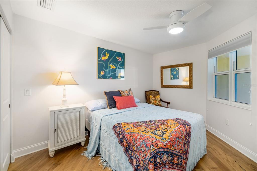 610 Riviera Dunes Way, Unit 503 Palmetto, FL 34221 - Photo 37 of 58 a bedroom with a bed and a window