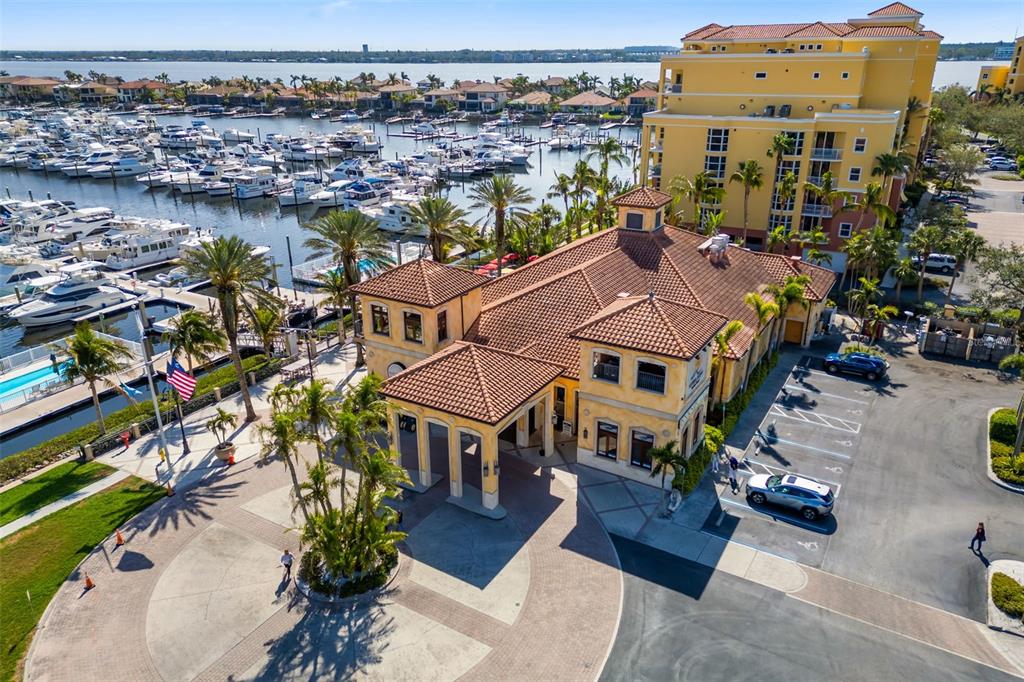 610 Riviera Dunes Way, Unit 503 Palmetto, FL 34221 - Photo 53 of 58 a aerial view of multiple houses with a yard