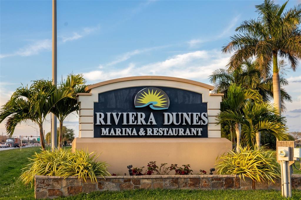 610 Riviera Dunes Way, Unit 503 Palmetto, FL 34221 - Photo 54 of 58 a view of sign board