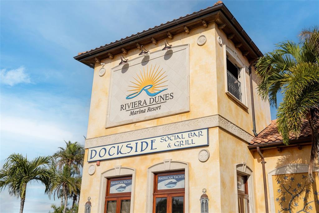 610 Riviera Dunes Way, Unit 503 Palmetto, FL 34221 - Photo 55 of 58 a view of a sign board