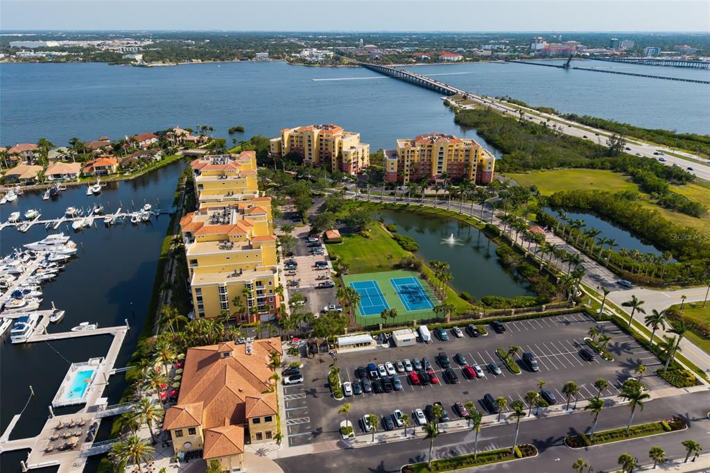 610 Riviera Dunes Way, Unit 503 Palmetto, FL 34221 - Photo 9 of 58 an aerial view of a city and lake view