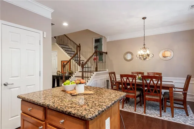 a view of dining room and kitchen counter space