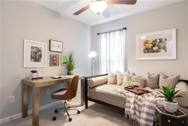 a bedroom with a bed and furniture