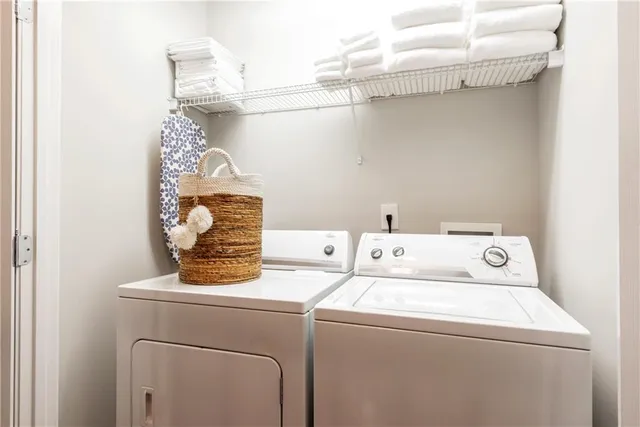a utility room with dryer and washer