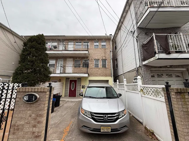 a car parked in front of a building