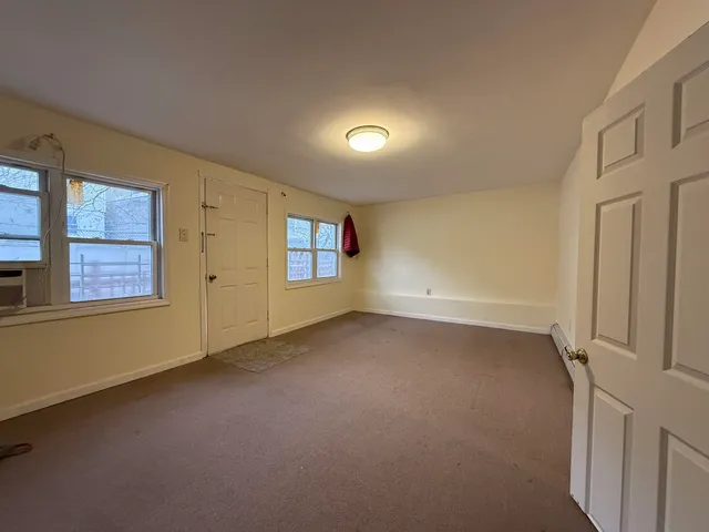 an empty room with windows