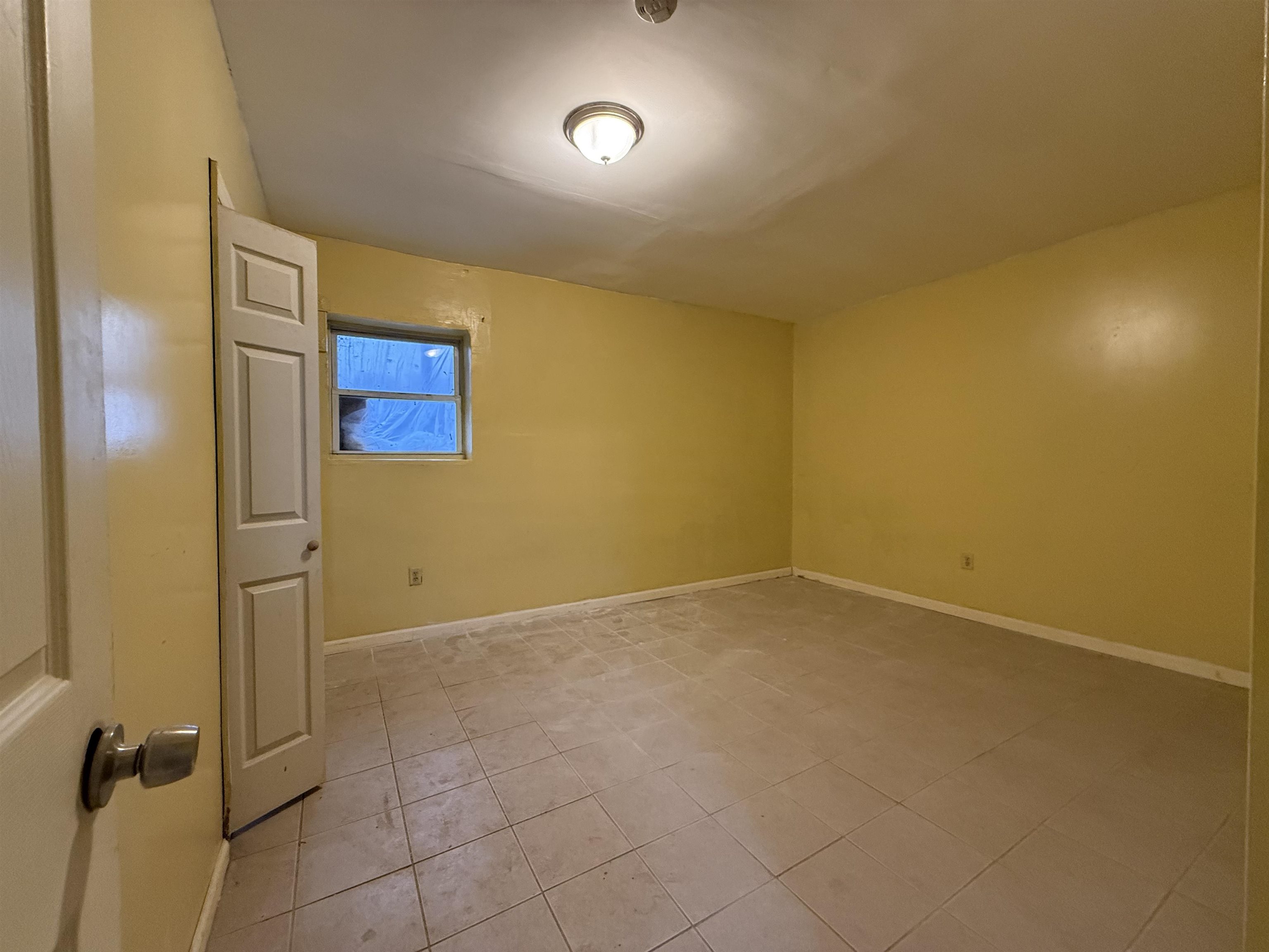 20 Dales Avenue, Unit 1 Jersey City, NJ 07306 - Photo 12 of 15 an empty room with a empty space and windows