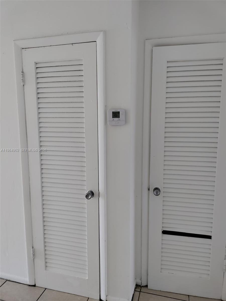 7340 Southwest 82nd Street, Unit C205 Miami, FL 33143 - Photo 15 of 34 a bathroom with a shower