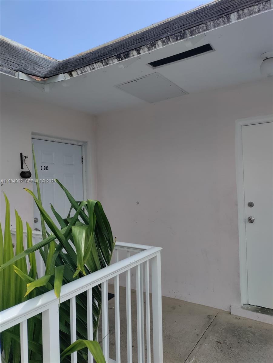 7340 Southwest 82nd Street, Unit C205 Miami, FL 33143 - Photo 27 of 34 a view of a porch