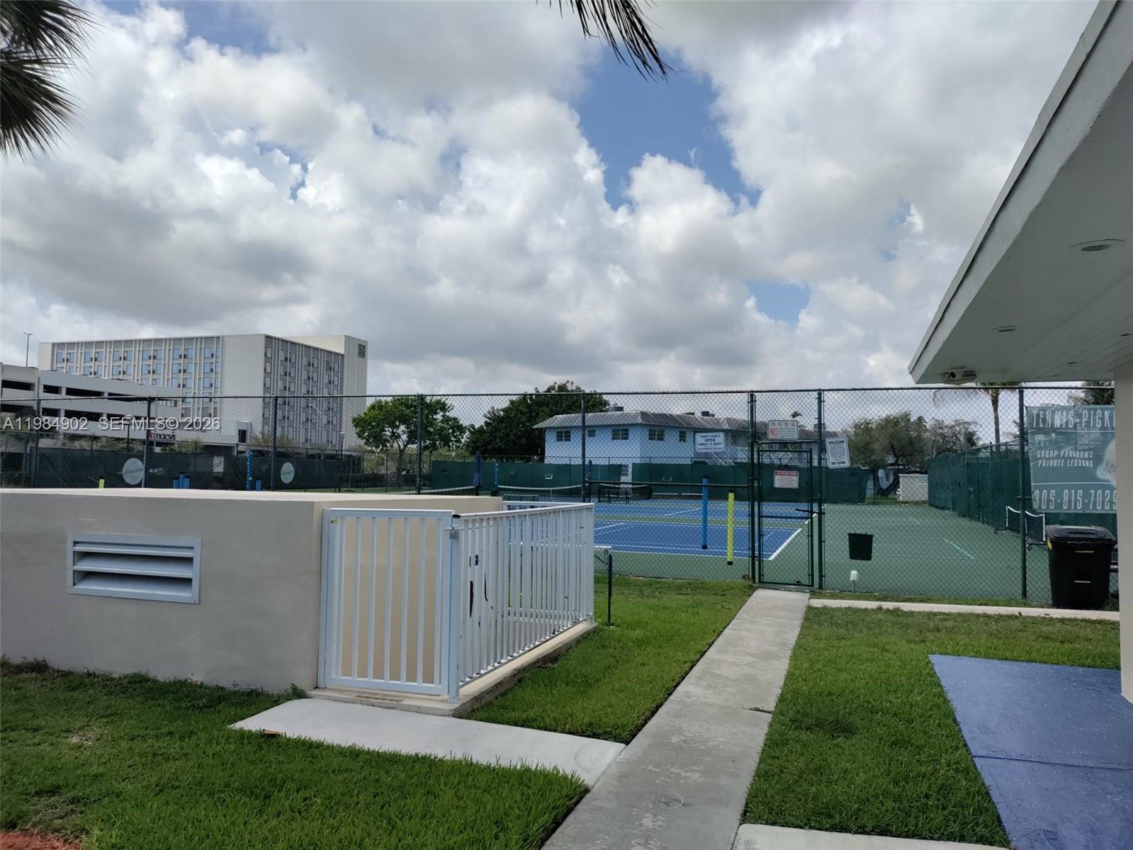 7340 Southwest 82nd Street, Unit C205 Miami, FL 33143 - Photo 29 of 34 a view of a garden