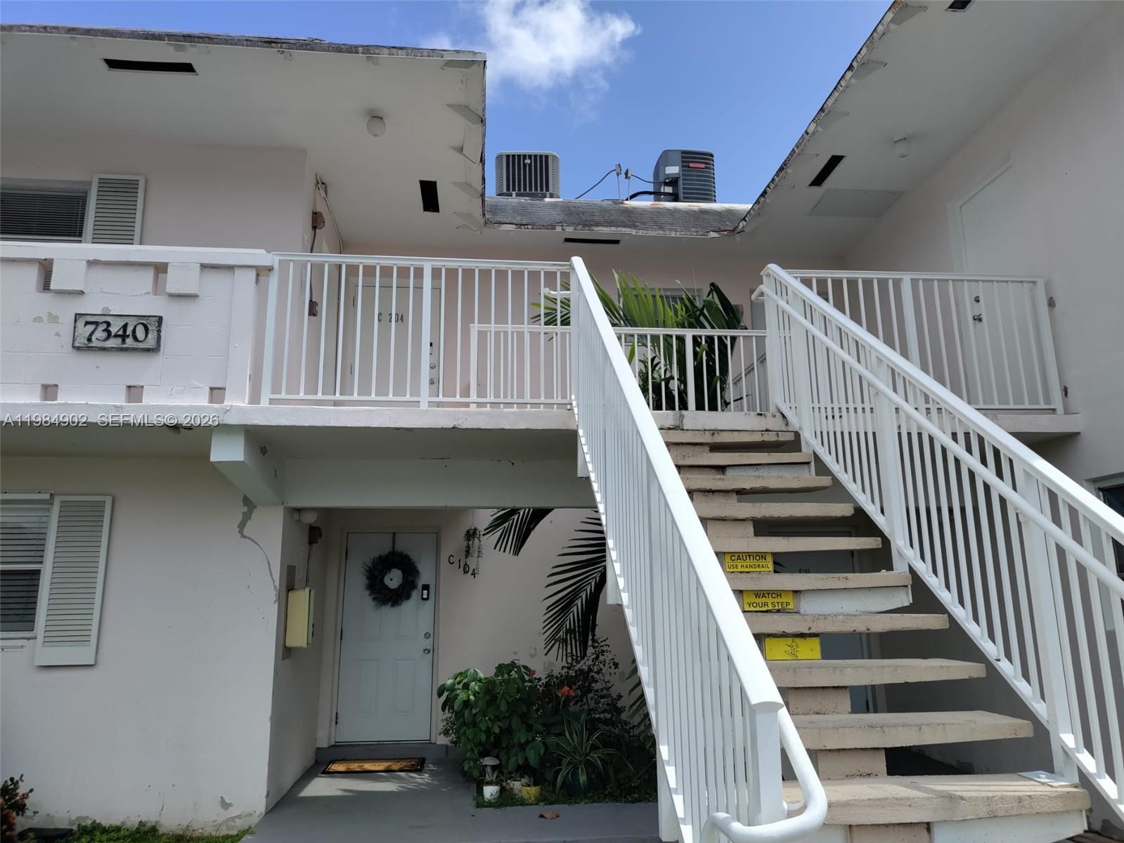 7340 Southwest 82nd Street, Unit C205 Miami, FL 33143 - Photo 30 of 34 a view of entryway and hall