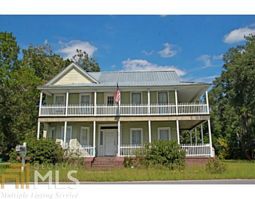703 Oak Street North Springfield, GA 31329 - Photo 1 of 1 a front view of a house with a yard