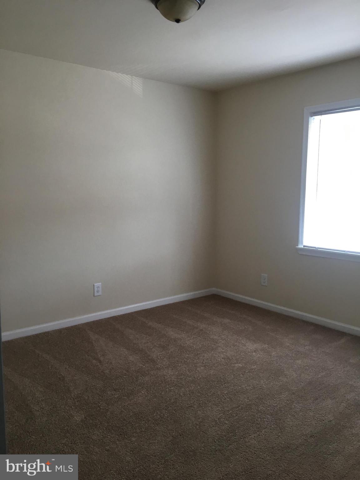 1 Pennsylvania Road, Unit 11 Glassboro, NJ 08028 - Photo 17 of 17 an empty room with a window