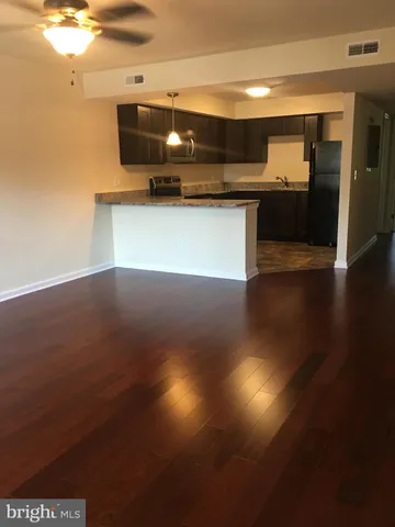 a view of kitchen and microwave