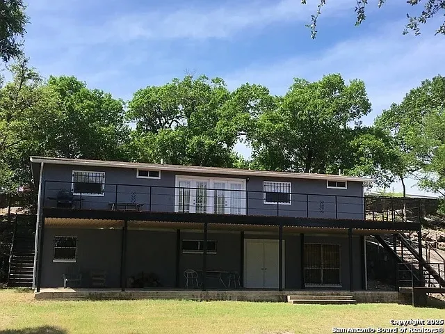 a view of a house with a swimming pool