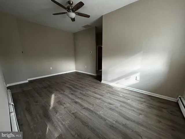 a view of a street with cars