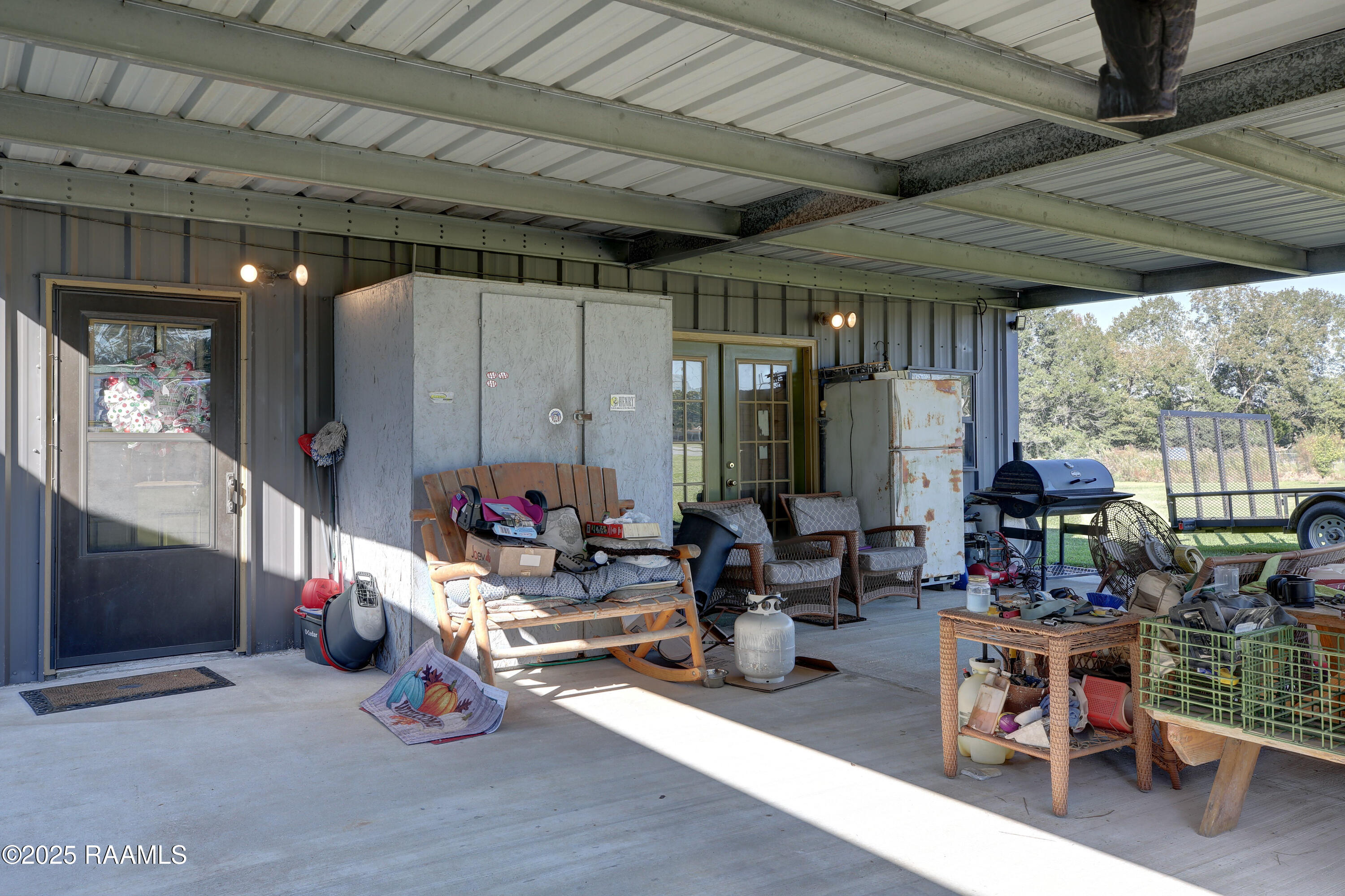 4616 Felix Road Youngsville, LA 70592 - Photo 12 of 16 Front Covered Patio