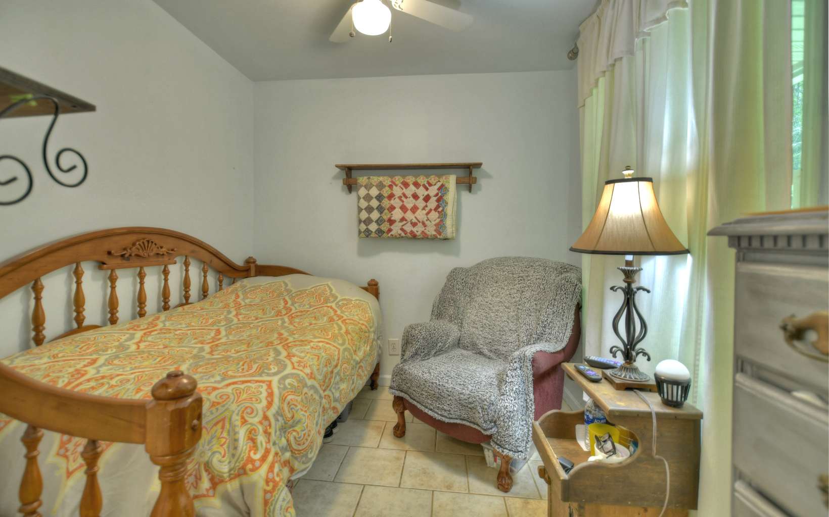 920 Tennis Court Road Blue Ridge, GA 30513 - Photo 13 of 56 a bedroom with a bed and lamp on table
