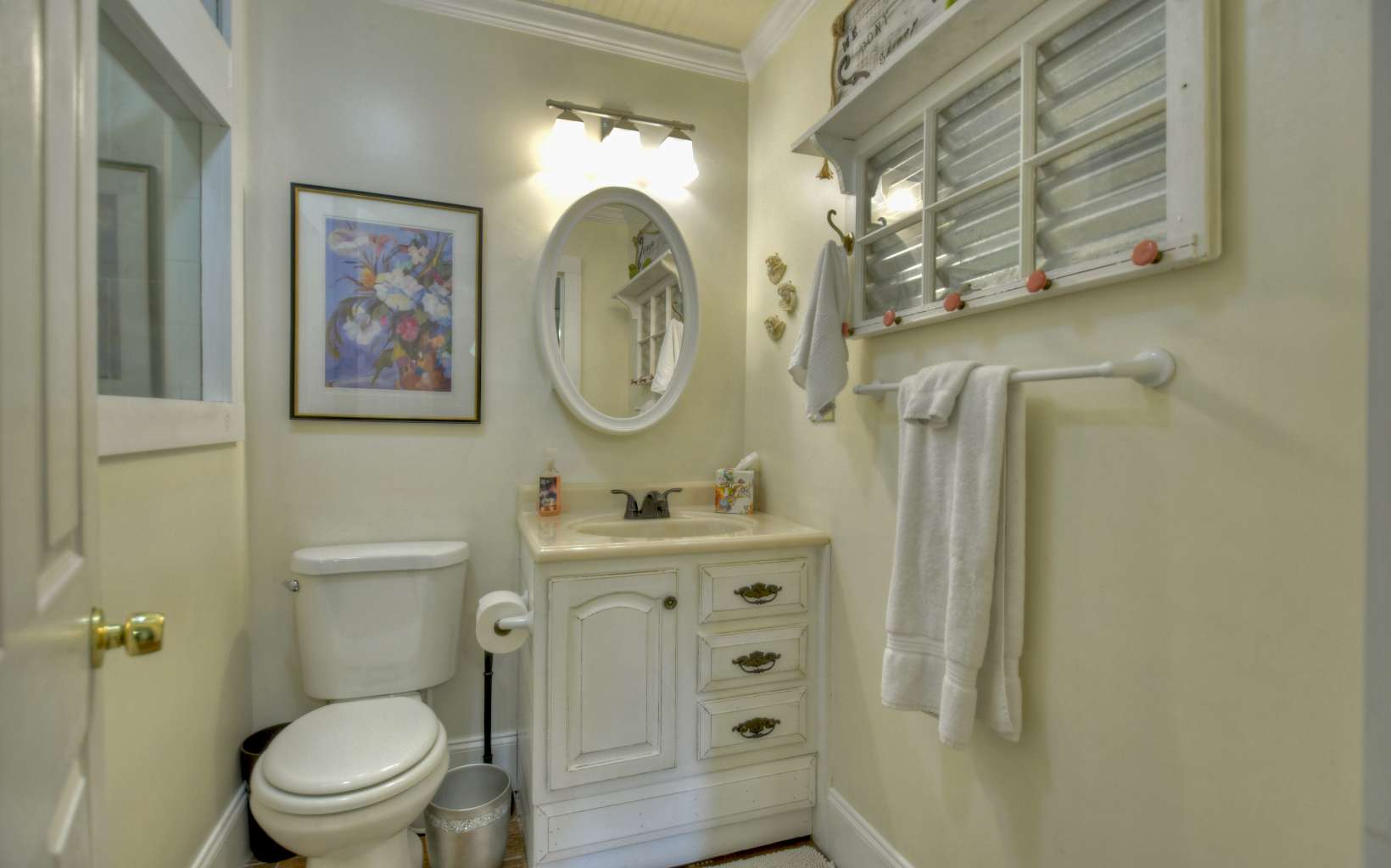 920 Tennis Court Road Blue Ridge, GA 30513 - Photo 15 of 56 a bathroom with a toilet a sink and a shower