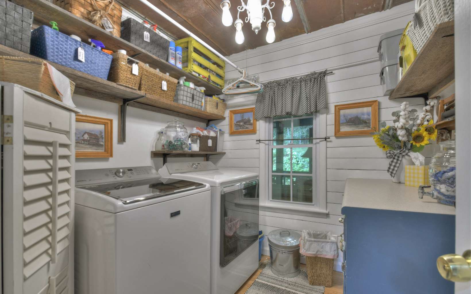 920 Tennis Court Road Blue Ridge, GA 30513 - Photo 19 of 56 a kitchen with a sink and a stove