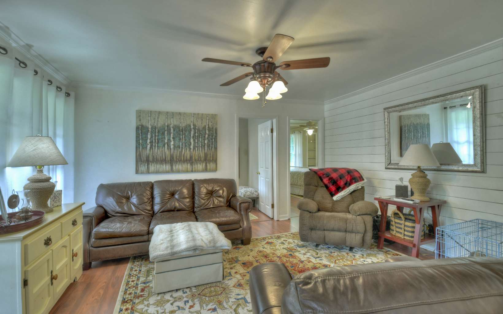 920 Tennis Court Road Blue Ridge, GA 30513 - Photo 25 of 56 a living room with furniture and a large window