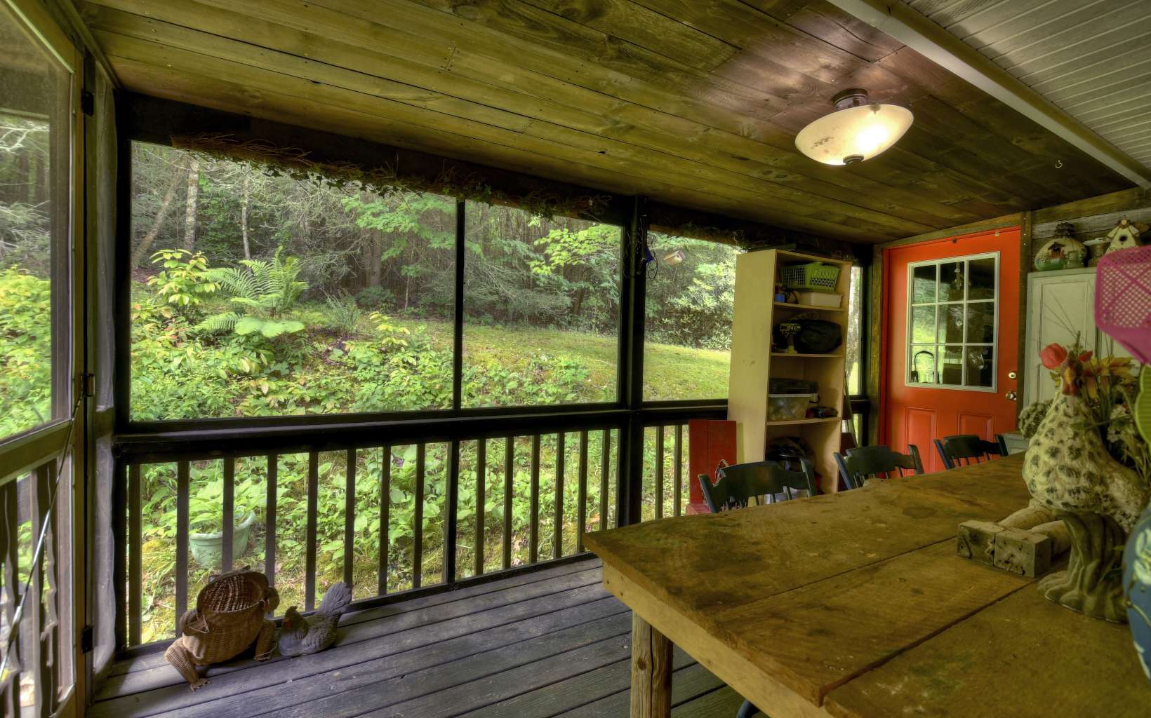 920 Tennis Court Road Blue Ridge, GA 30513 - Photo 30 of 56 a view of a balcony with furniture and wooden floor