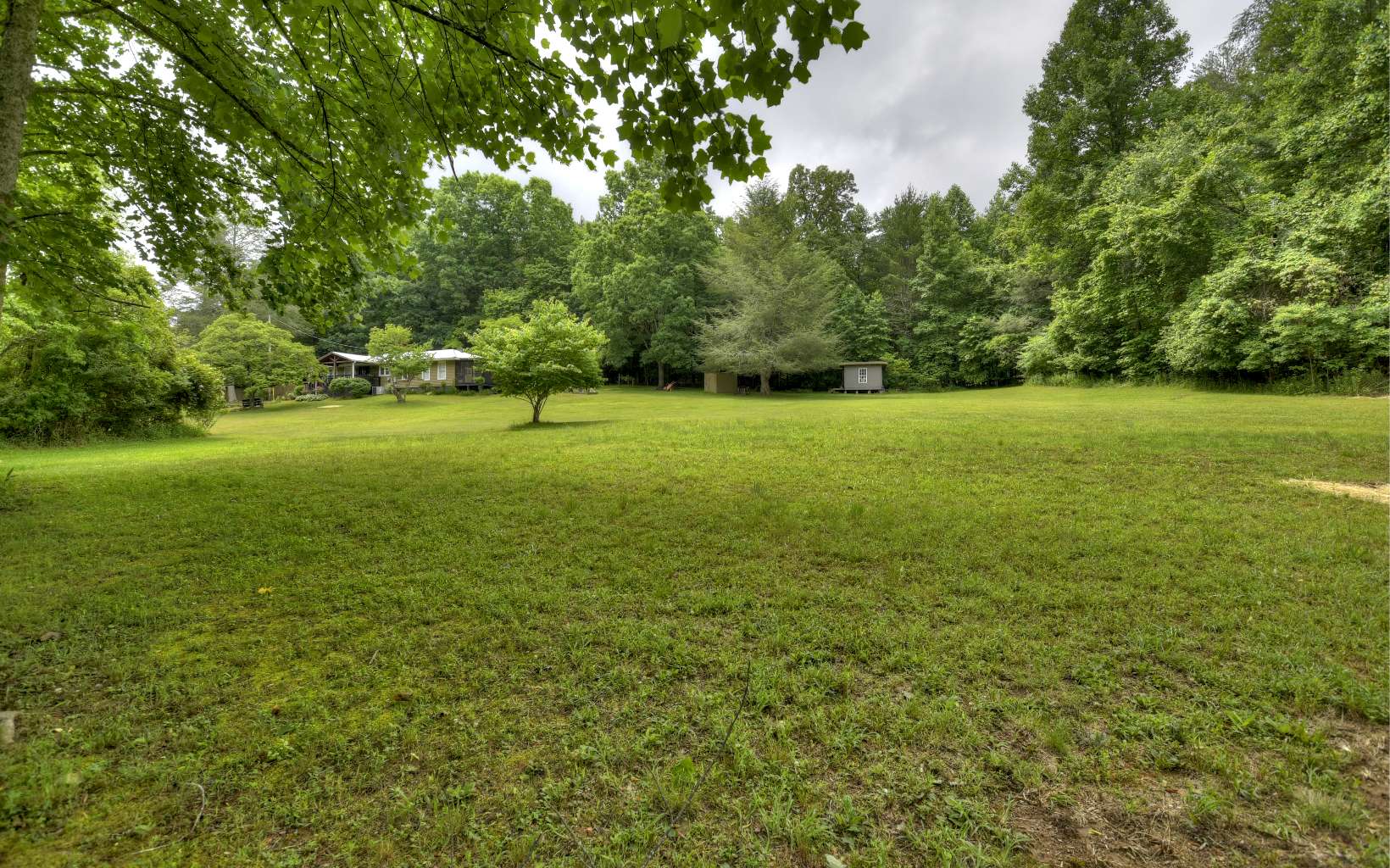 920 Tennis Court Road Blue Ridge, GA 30513 - Photo 36 of 56 a view of an outdoor space and a yard