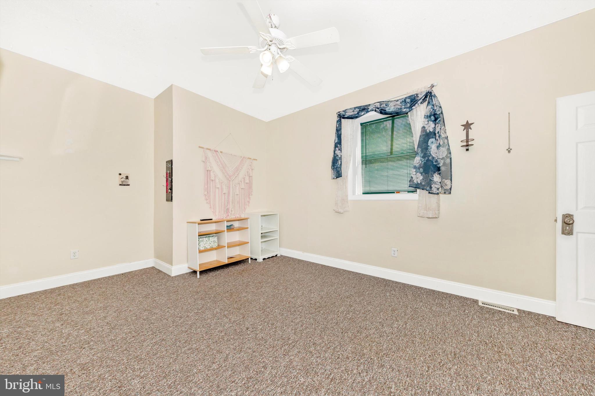 13450 Millstone Circle Hancock, MD 21750 - Photo 23 of 61 an empty room with chandelier fan