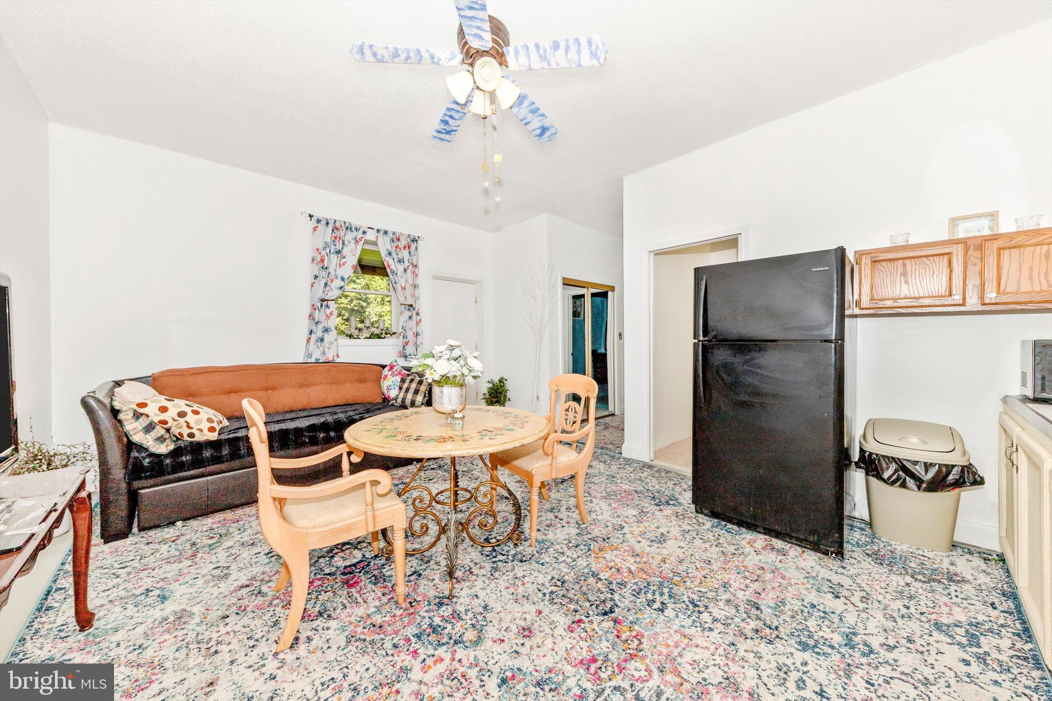 13450 Millstone Circle Hancock, MD 21750 - Photo 25 of 61 a dining room with furniture and window