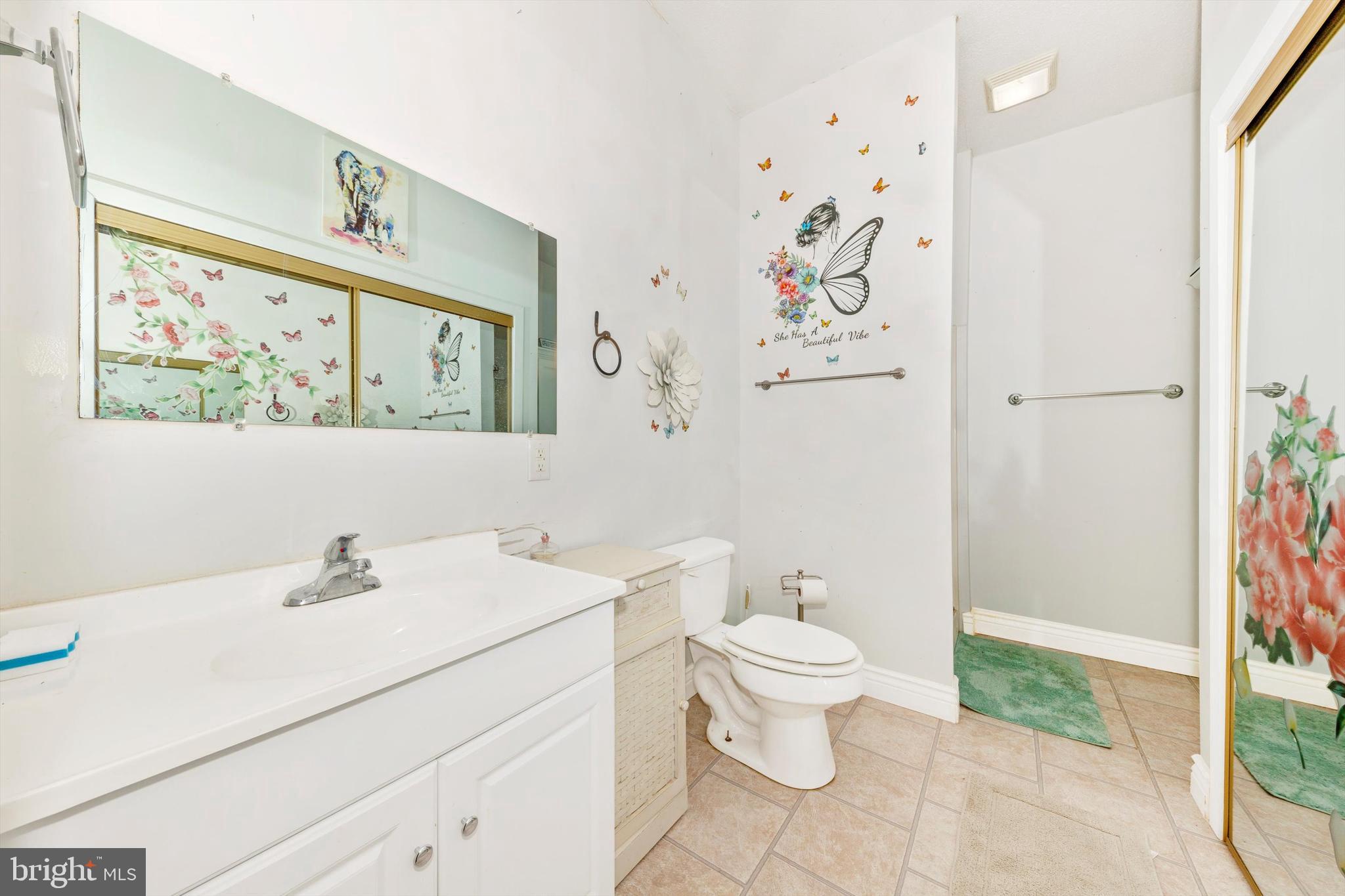 13450 Millstone Circle Hancock, MD 21750 - Photo 29 of 61 a bathroom with a sink mirror and toilet