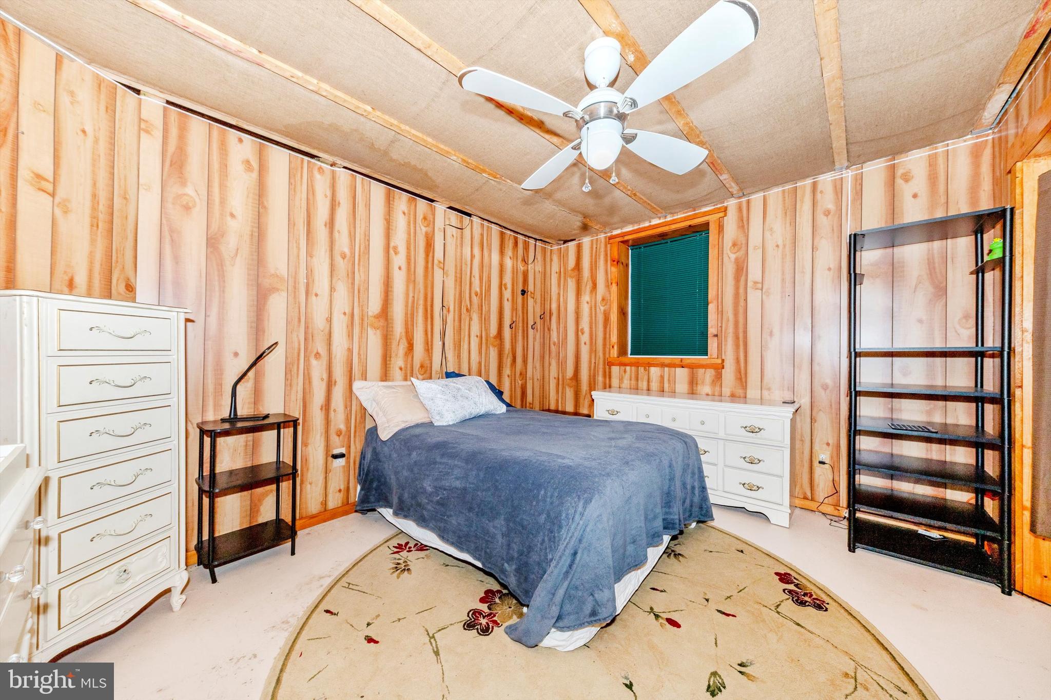13450 Millstone Circle Hancock, MD 21750 - Photo 38 of 61 a bedroom with a bed and a dresser