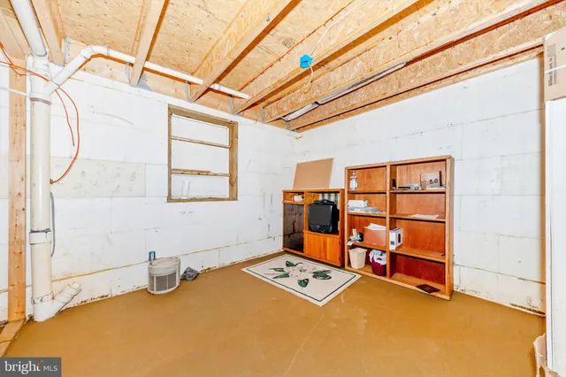 a view of a furniture and window in a room