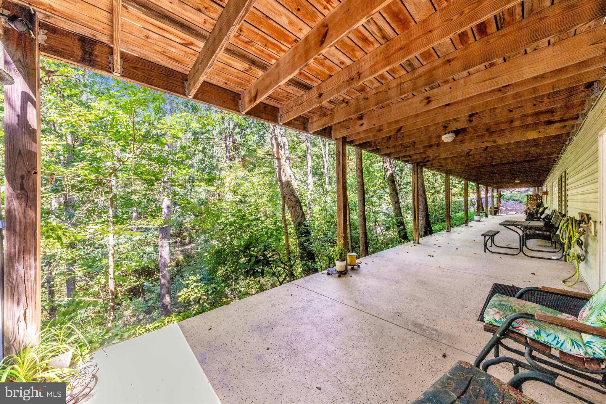 13450 Millstone Circle Hancock, MD 21750 - Photo 49 of 61 a view of porch with seating space