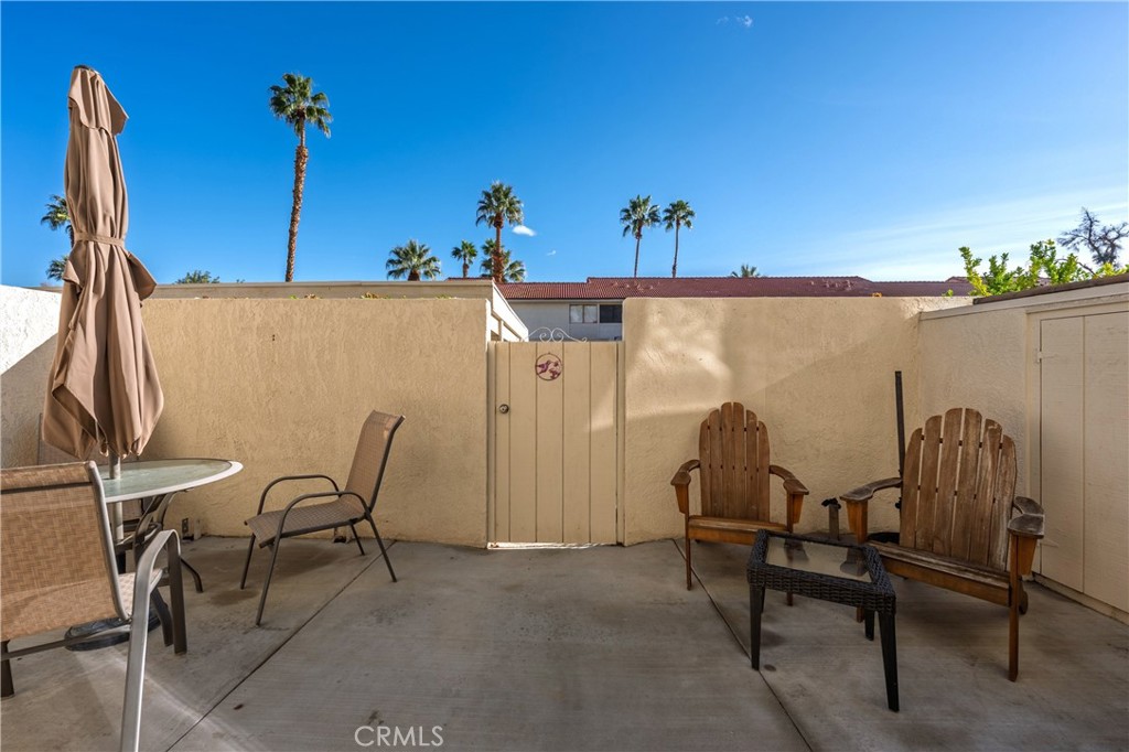 6147 Arroyo Road, Unit 4 Palm Springs, CA 92264 - Photo 10 of 31 Back patio off of kitchen