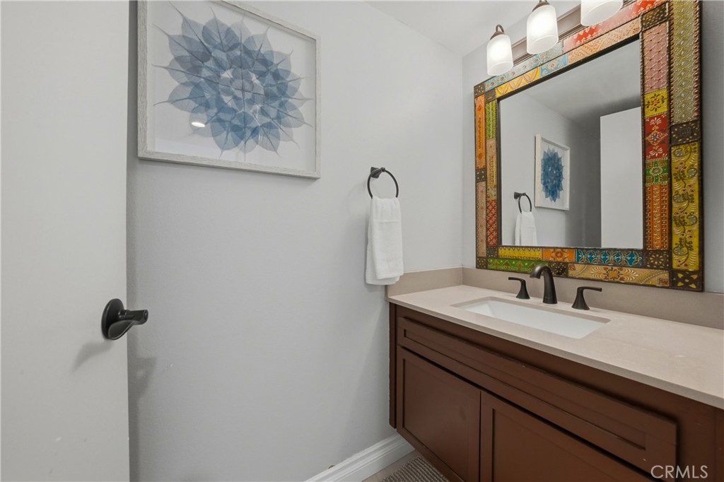 6147 Arroyo Road, Unit 4 Palm Springs, CA 92264 - Photo 14 of 31 Main level powder bathroom
