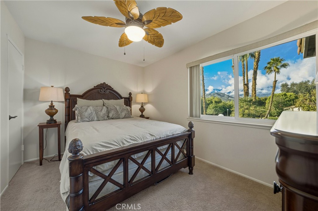 6147 Arroyo Road, Unit 4 Palm Springs, CA 92264 - Photo 19 of 31 Second upstairs bedroom with mountain and pool views