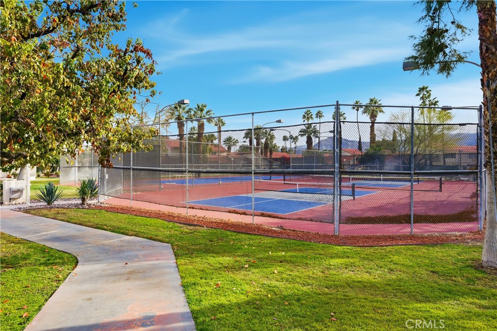 6147 Arroyo Road, Unit 4 Palm Springs, CA 92264 - Photo 26 of 31 Community pickleball and tennis courts