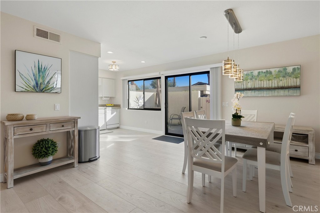 6147 Arroyo Road, Unit 4 Palm Springs, CA 92264 - Photo 6 of 31 Dining area and entrance to kitchen