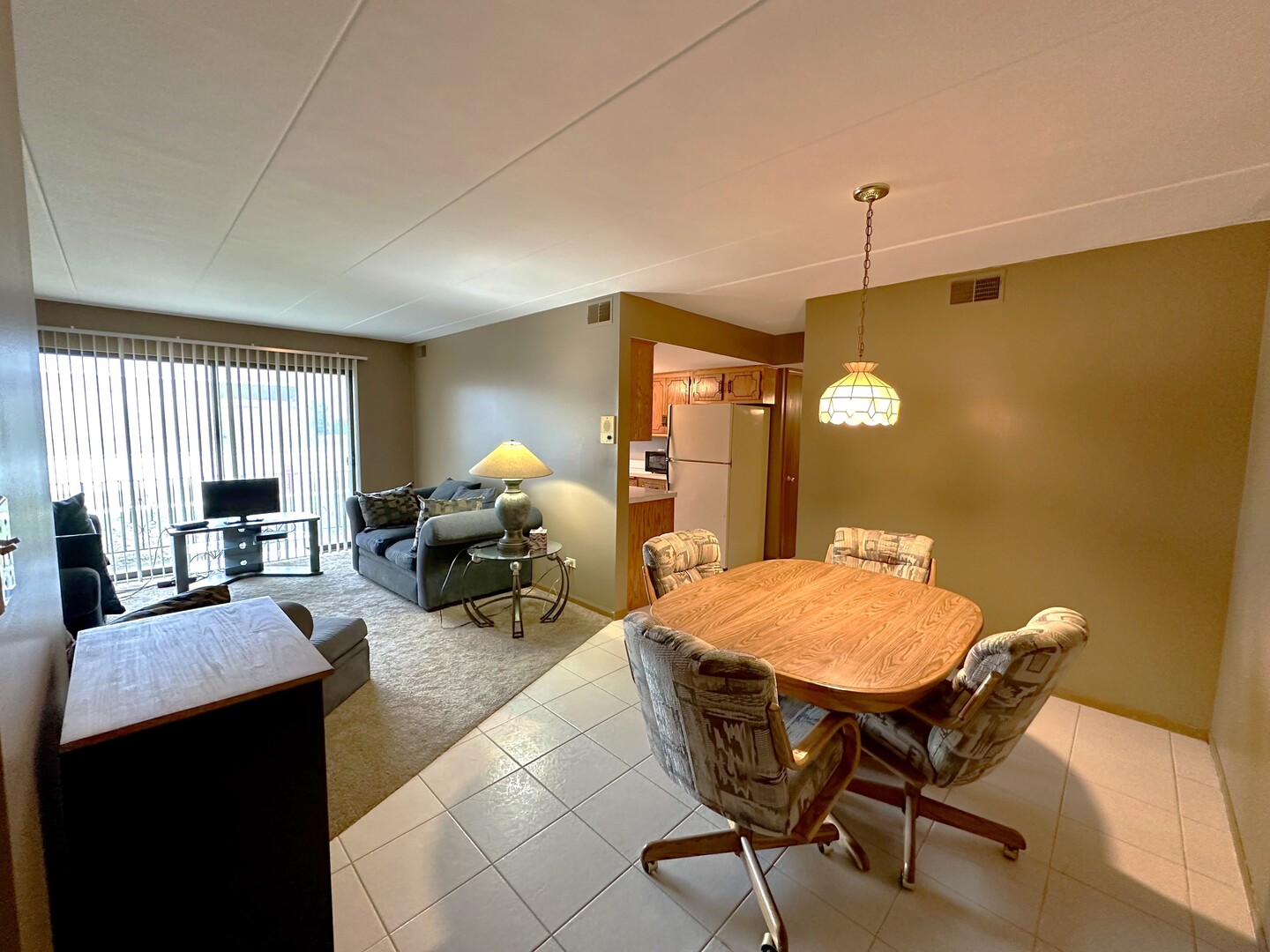 10930 Central Avenue, Unit 1B Chicago Ridge, IL 60415 - Photo 3 of 22 a view of a livingroom with furniture and window