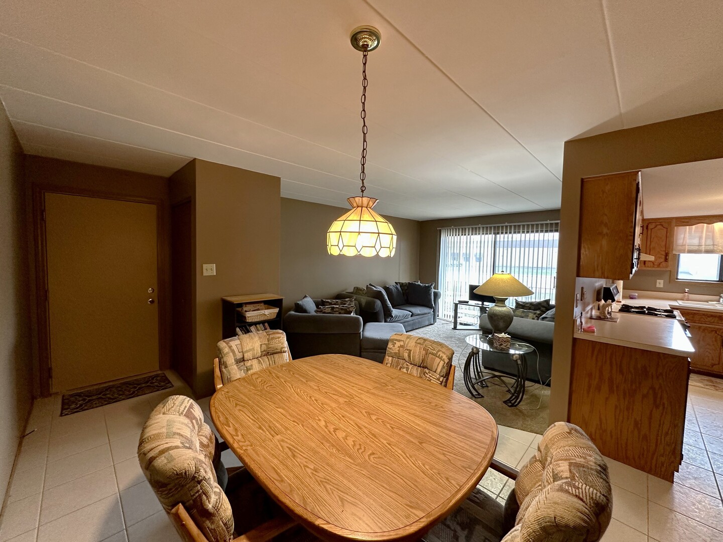 10930 Central Avenue, Unit 1B Chicago Ridge, IL 60415 - Photo 4 of 22 a bed room with furniture and a chandelier